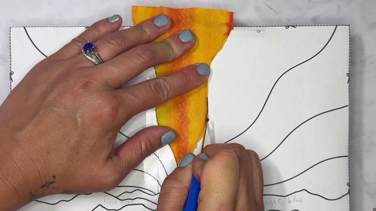 Building the sunrise sky sections from striated batik fabric