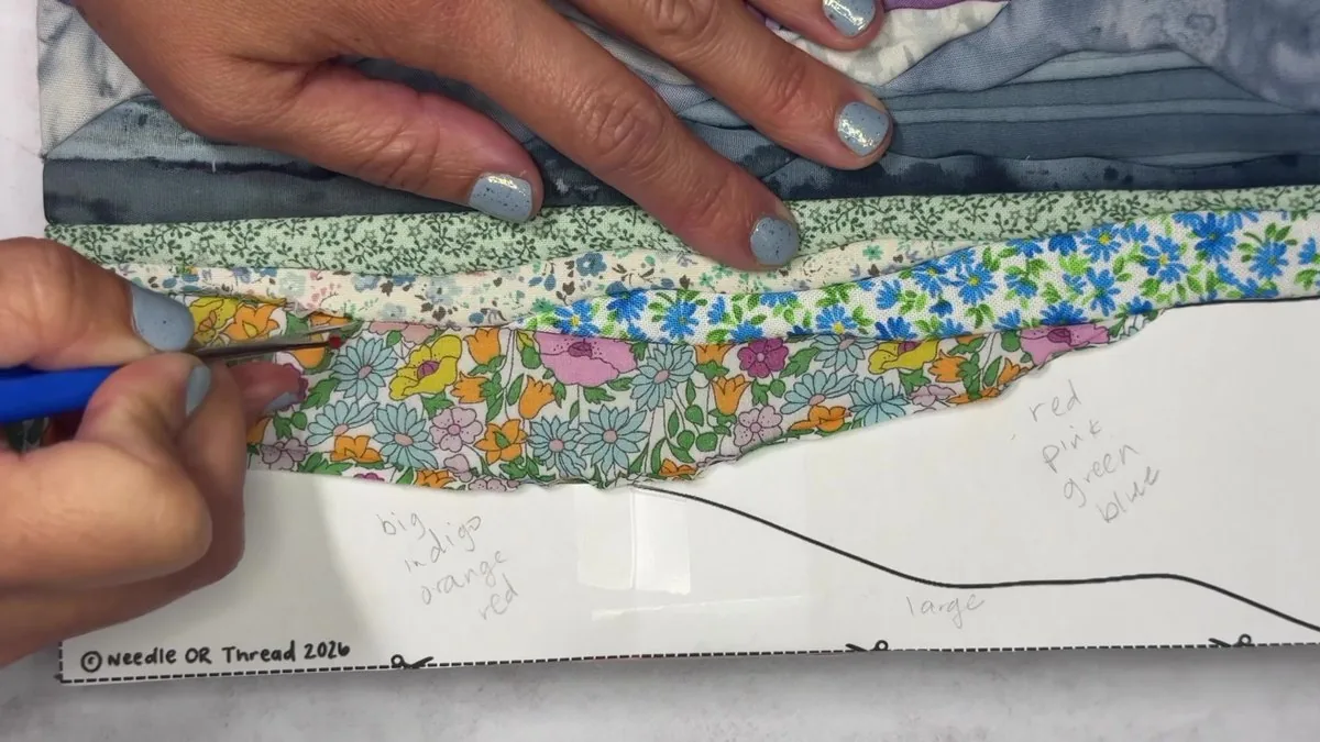 Carving the mountain ridgeline and filling the wildflower meadow with floral prints